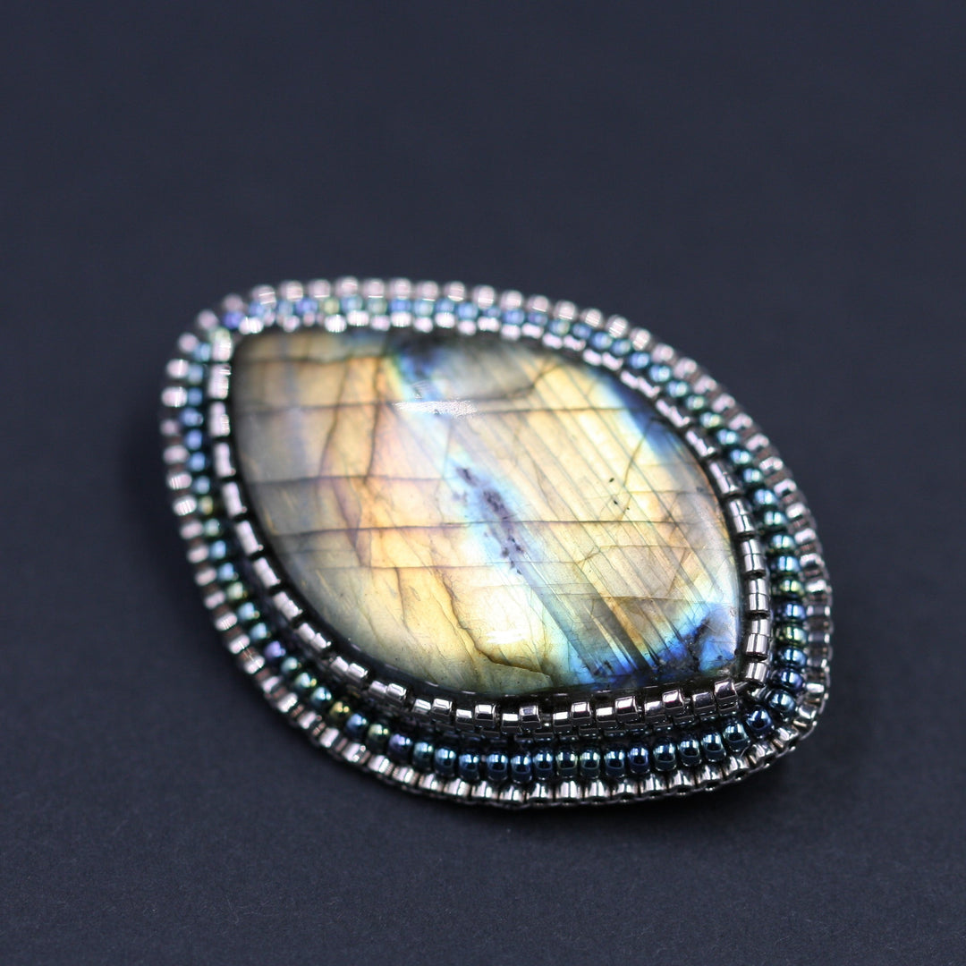 Embroidered brooch, labradorite