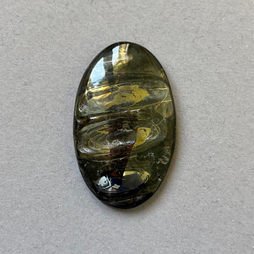 Pyritisierter Ammonit, AM_P205, Cabochon-Schliff, 45x27x7 mm