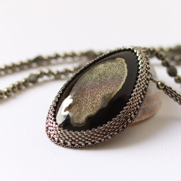 Necklace with pyritized ammonite