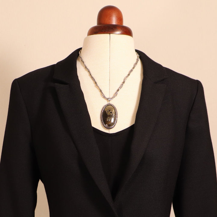 Necklace with pyritized ammonite and yellow calcite