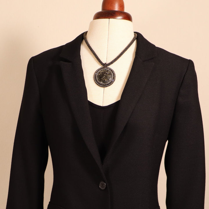 Embroidered necklace with micaschist (mica and garnet)