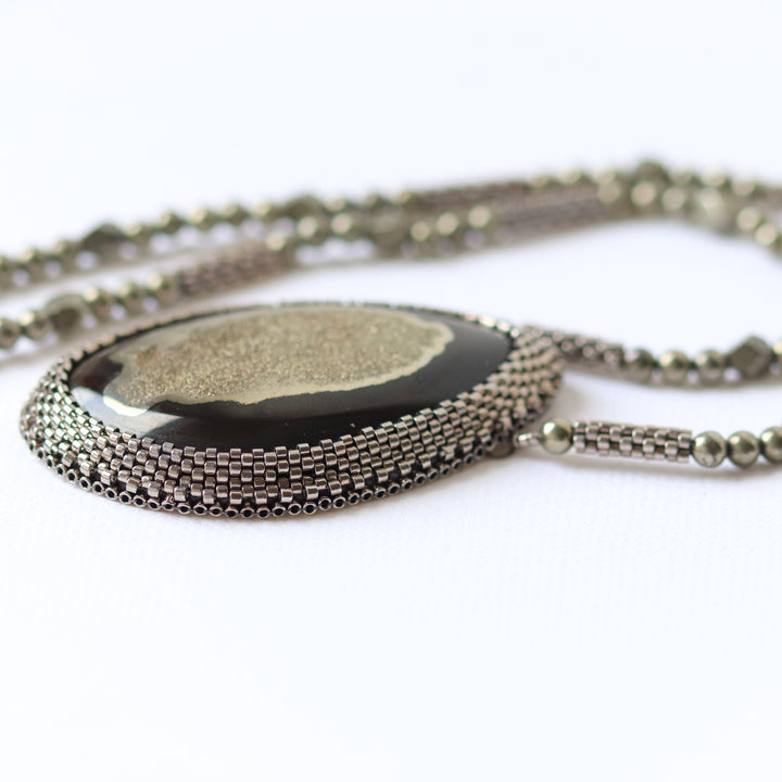 Necklace with pyritized ammonite