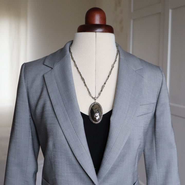 Necklace with pyritized ammonite and yellow calcite