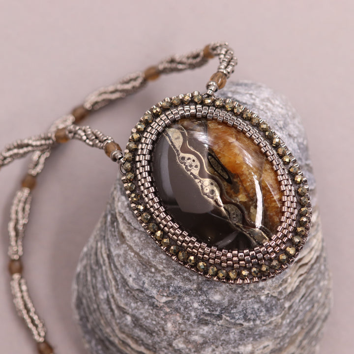 Necklace with pyritized ammonite and yellow calcite