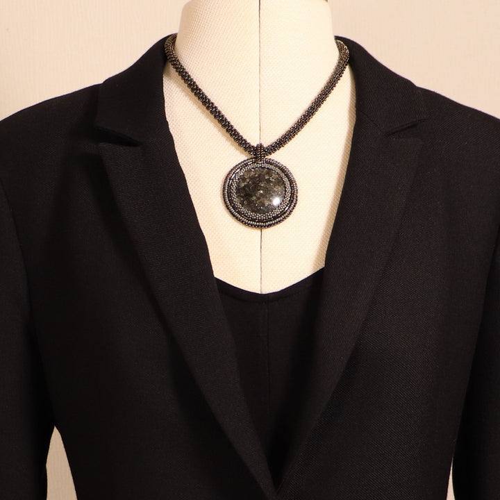 Embroidered necklace with micaschist (mica and garnet)