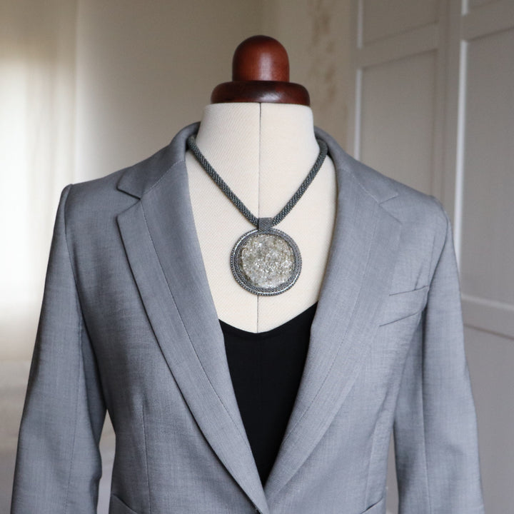 Embroidered necklace with micaschist (mica and garnet)