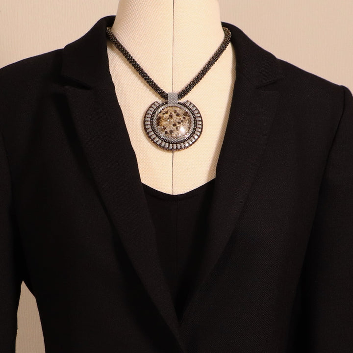 Embroidered necklace with micaschist (mica and garnet)