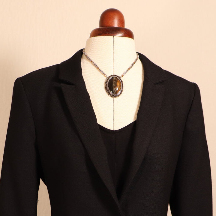 Necklace with pyritized ammonite and yellow calcite