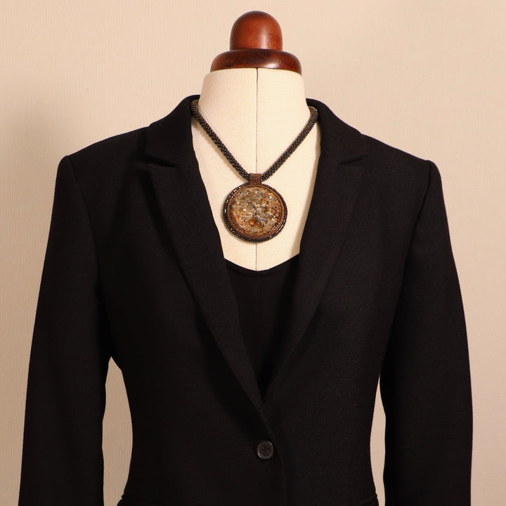 Embroidered necklace with micaschist (mica and garnet)