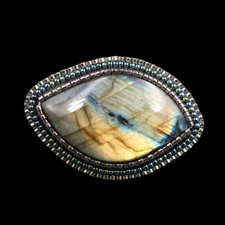 Embroidered brooch, labradorite