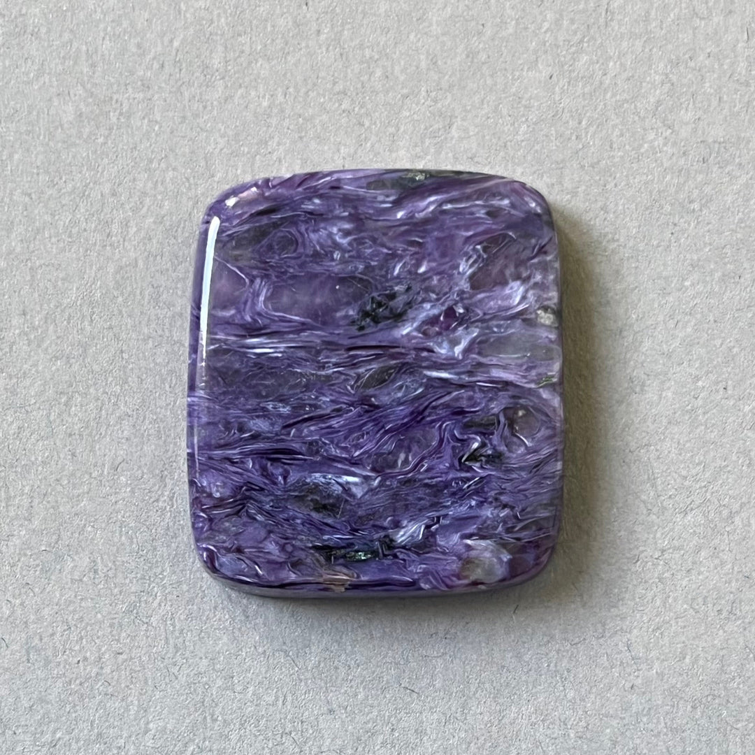 Charoite, CHR060, cabochon cut, 30x26x6 mm