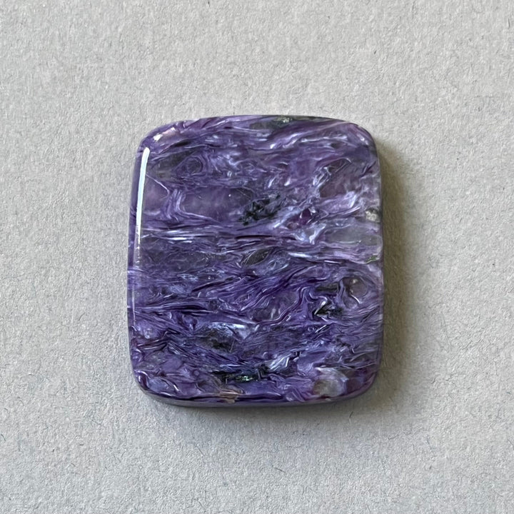 Charoite, CHR060, cabochon cut, 30x26x6 mm