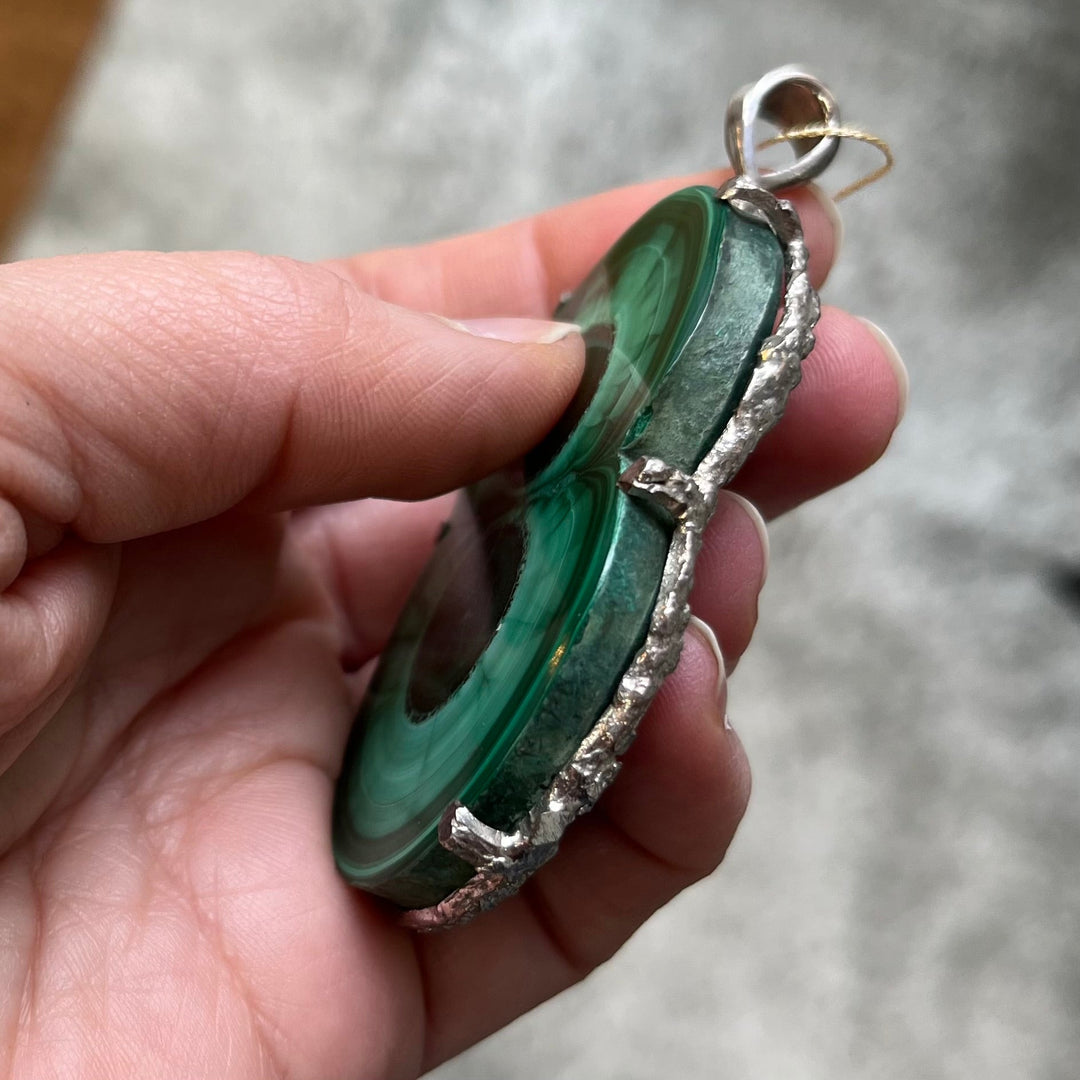 Silver pendant with malachite, a magnificent slice of stalactite