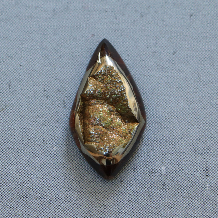 Pyritisierter Ammonit, tAM_P072, Cabochon-Schliff, 45x24x9 mm; 15,8 g;