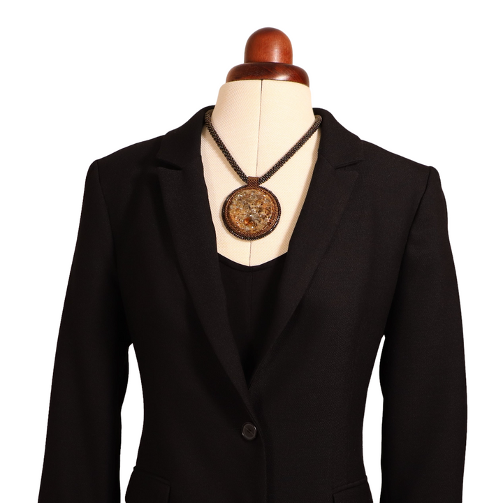 Embroidered necklace with micaschist (mica and garnet)