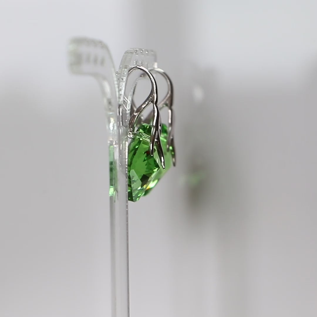 Pendant, Swarovski crystals, rhodium silver, olive green, AGATHE